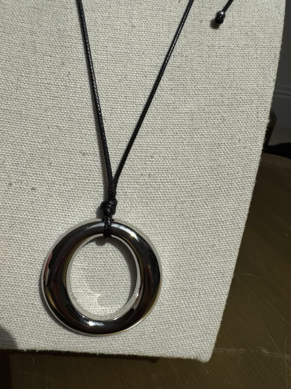 Sample sale number 10-cord necklace with silver hoop. - Image 2
